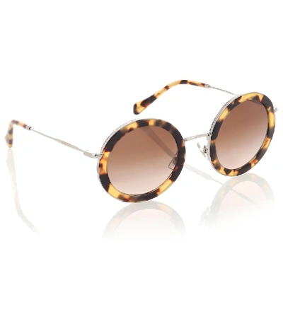 Shop Miu Miu Round Sunglasses In Brown