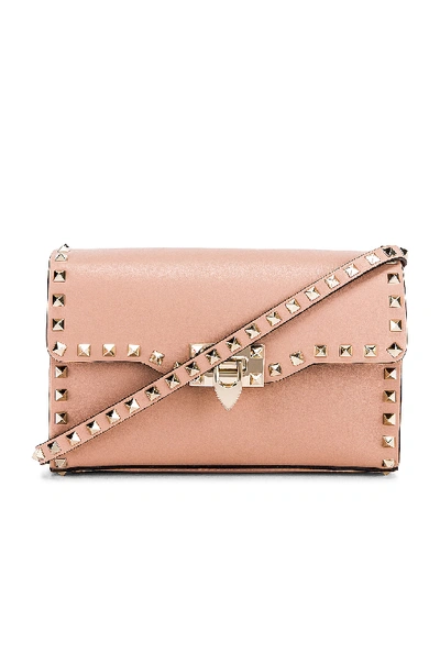 Shop Valentino Rockstud Small Shoulder Bag In Rose Cannelle