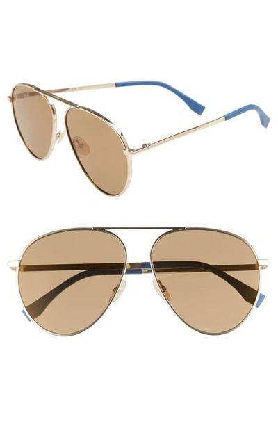 Shop Fendi 61mm Aviator Sunglasses - Gold