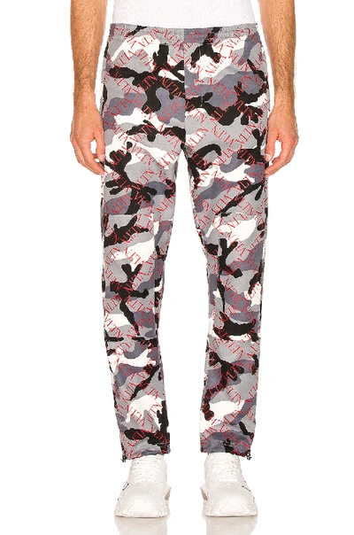Shop Valentino Trousers In Grey & Red Camo