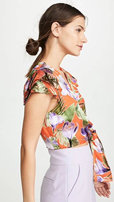 Shop Alice And Olivia Zabel Cropped Wrap Top In Floral Palm Coral