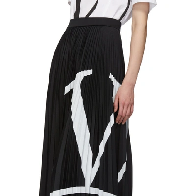 Shop Valentino Black Pleated Vlogo Skirt In 0ni Blk Wht