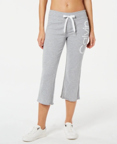 Shop Calvin Klein Performance Logo Cropped Sweatpants In Pearl Grey Heather