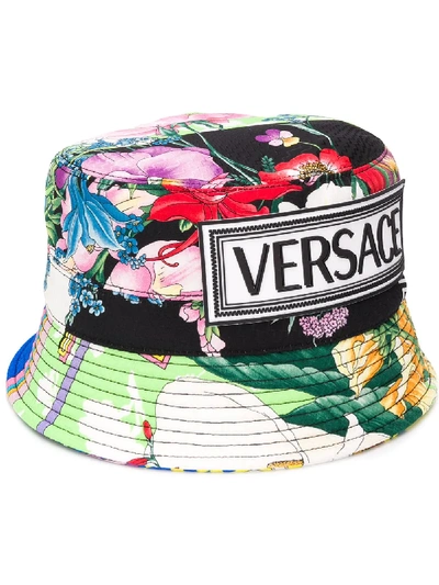 Shop Versace Floral Print Bucket Hat - White