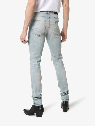 Shop Amiri Embroidered Patchwork Skinny Jeans In Blue