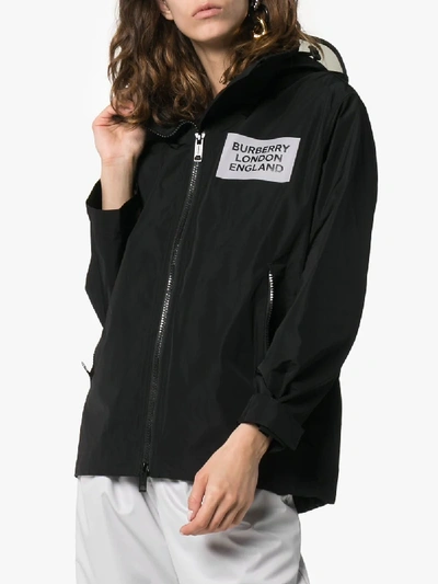 Shop Burberry Millport Hooded Raincoat In Black