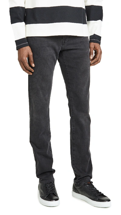 Shop Frame L'homme Slim Fade To Grey Denim Jeans Fade To Grey