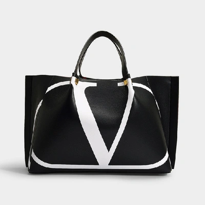 Shop Valentino Garavani | Medium Tote Go Logo In Black And White Calfskin