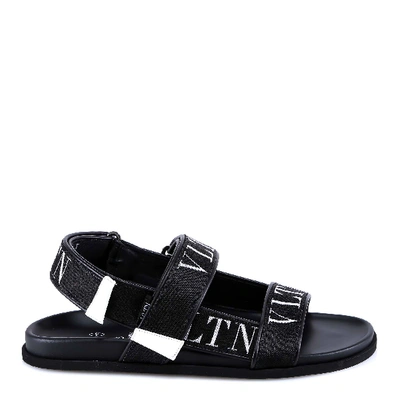 Shop Valentino Vltn Logo Strap Sandals In Black