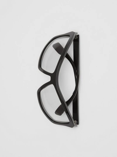 Shop Burberry Wrap Frame Sunglasses In Black