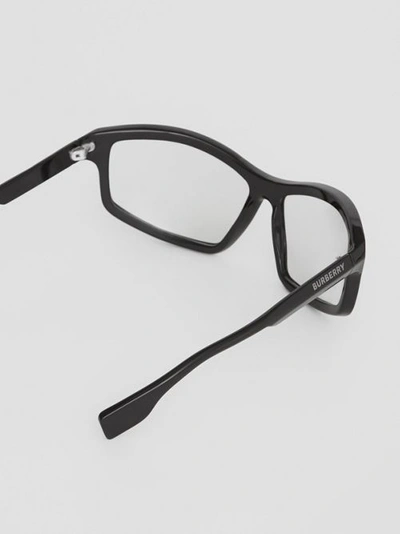 Shop Burberry Wrap Frame Sunglasses In Black