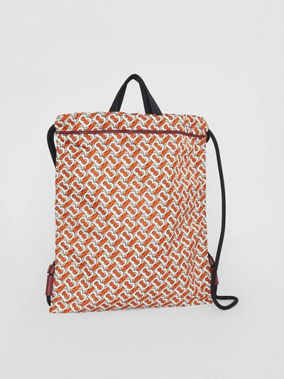 Shop Burberry Monogram Print Nylon Drawcord Backpack In 버밀리언