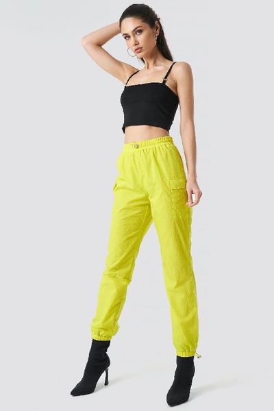 Shop Anna Nooshin X Na-kd Side Pocket Track Pants - Yellow In Lime