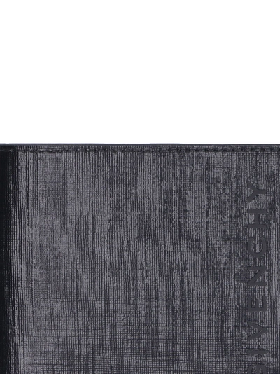 Shop Givenchy Flap-over Wallet In Black