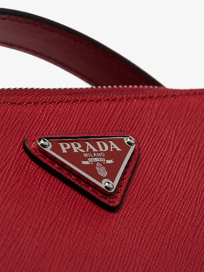 Shop Prada Kuriertasche Mit Logo-schild In Red