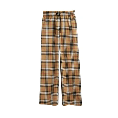 Shop Burberry Vintage Check Cotton Drawcord Trousers In Antique Yel Ip Chk