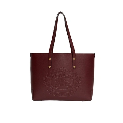 Shop Burberry Small Embossed Crest Leather Tote In Burgundy