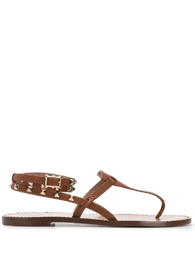 Shop Valentino Rockstud Flat Sandals In Brown