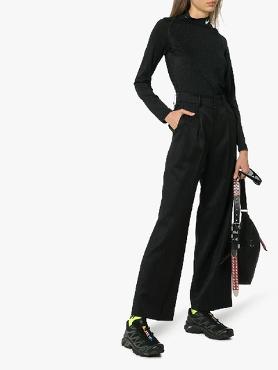 Shop Ader Error Pinstripe Flared Wool Blend Trousers In Black
