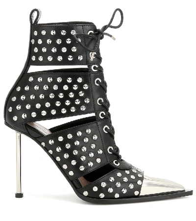 Shop Alexander Mcqueen Studded Leather Ankle Boots In Black