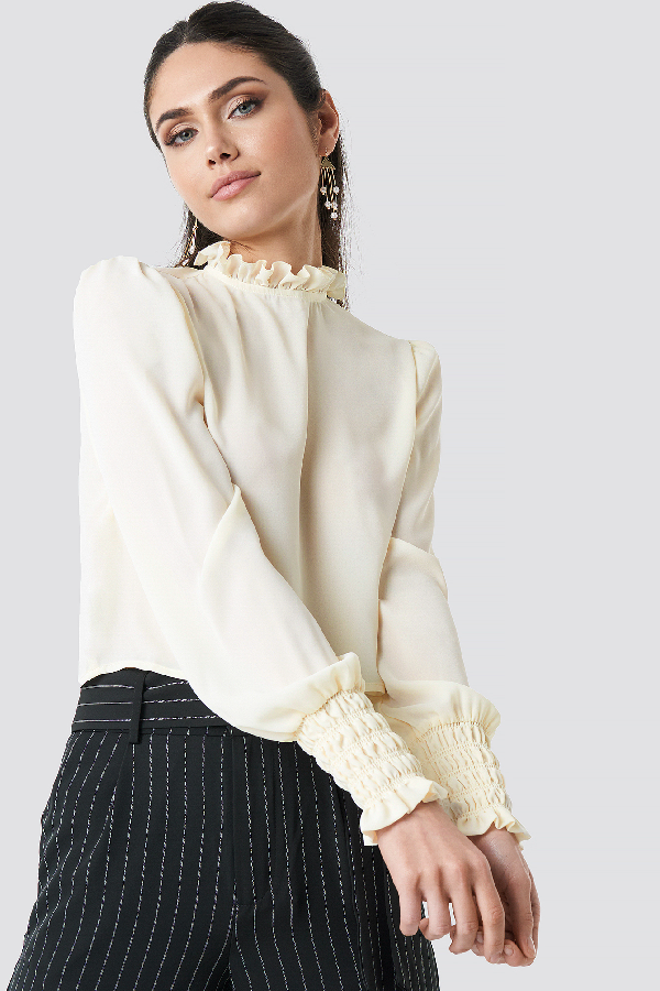 frill neck blouses