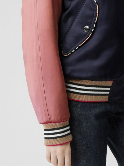 Shop Burberry Icon Stripe Detail Monogram Motif Bomber Jacket In Navy/pink