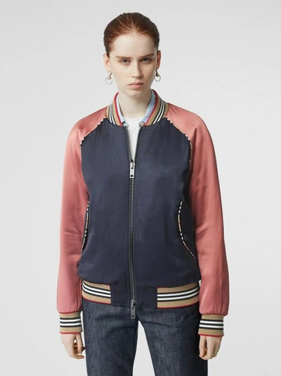 Shop Burberry Icon Stripe Detail Monogram Motif Bomber Jacket In Navy/pink