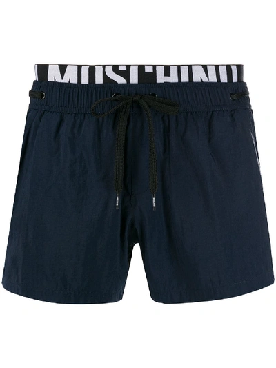 Shop Moschino Logo Waistband Swim Shorts - Blue