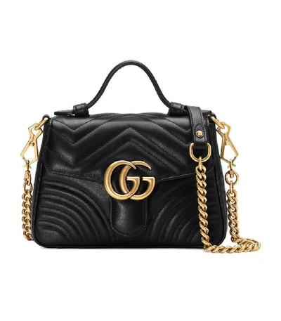 Shop Gucci Gg Marmont Mini Top Handle Bag In Black