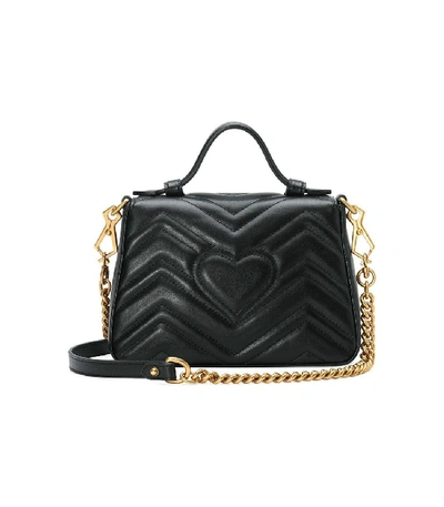 Shop Gucci Gg Marmont Mini Top Handle Bag In Black