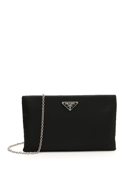 Shop Prada Padded Logo Clutch Bag In Black