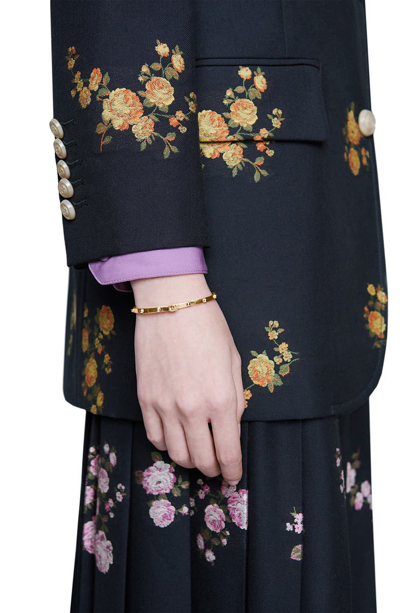 Shop Gucci Running Gg Bracelet In Yellow Gold