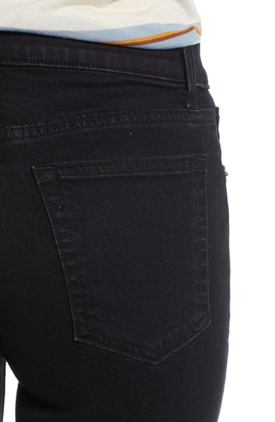 Shop Reformation High & Skinny Jeans In Faded Black Destroyed