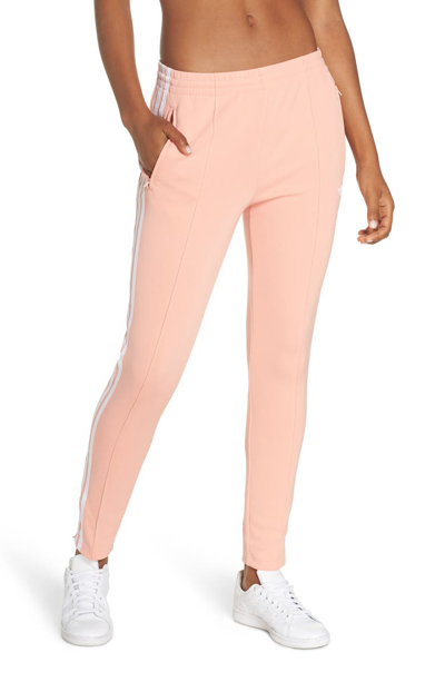 Shop Adidas Originals Adidas Sst Track Pants In Dust Pink