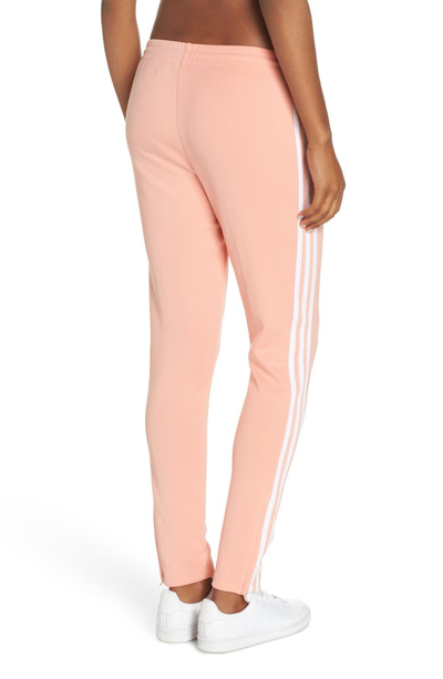 Shop Adidas Originals Adidas Sst Track Pants In Dust Pink