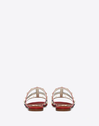Shop Valentino Multicolor Rockstud Caged Flat Slide Sandal In Red