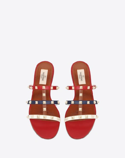 Shop Valentino Multicolor Rockstud Caged Flat Slide Sandal In Red