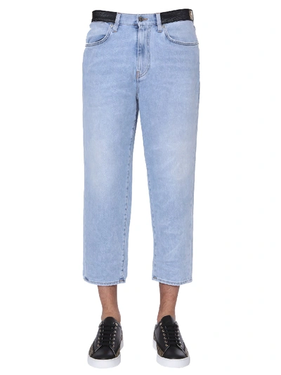 Shop Versace Cropped Jeans In Denim