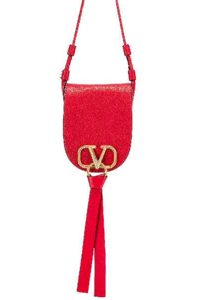 Shop Valentino Vring Small Saddle Bag In Red In Rouge