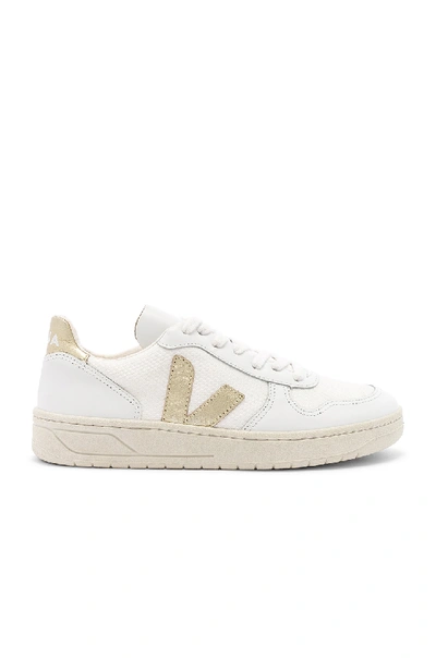 Shop Veja V-10 Sneaker In White & Gold