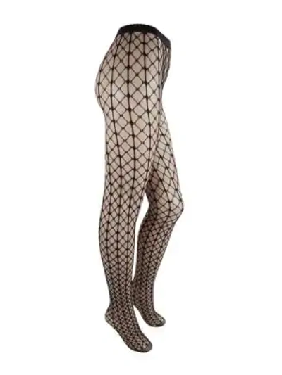 Shop Wolford Tina Fishnet Patterned Tights In Black