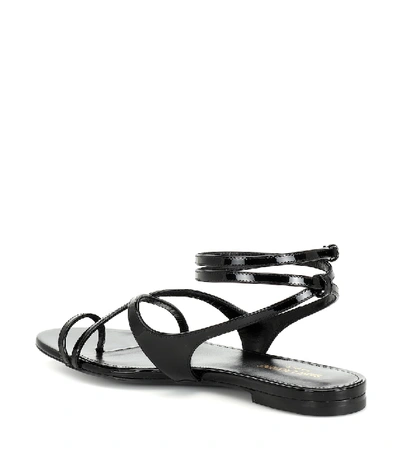 Shop Saint Laurent Gia Patent Leather Sandals In Black