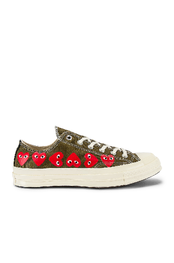 comme des garcons play emblem low top sneaker