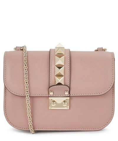 Shop Valentino Small Leather Rockstud Cross-body Bag In Poudre