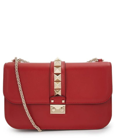 Shop Valentino Medium Leather Rockstud Shoulder Bag In Rosso