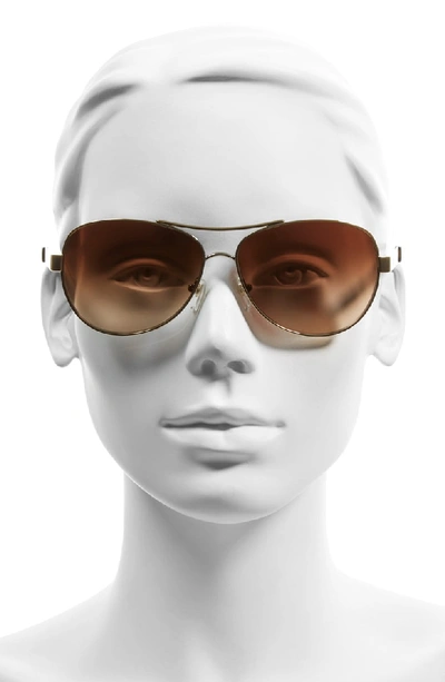 Shop Tory Burch 59mm Aviator Sunglasses - Gold