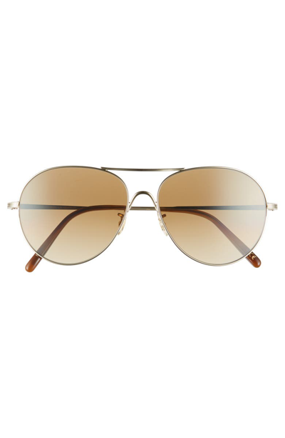 Shop Oliver Peoples Rockmore 58mm Photochromic Aviator Sunglasses - Chrome Amber/ Gold