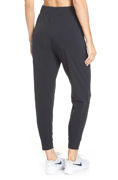 Shop Nike Dry Bliss Pants In Black/ Clear