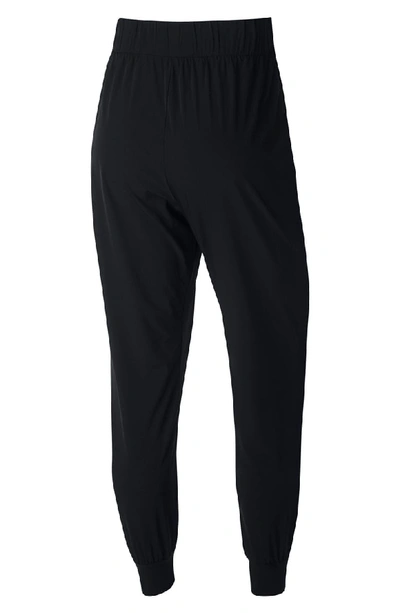 Shop Nike Dry Bliss Pants In Black/ Clear