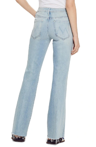 Shop Mother Frayed Flare Jeans In Swimming Pool Sunday